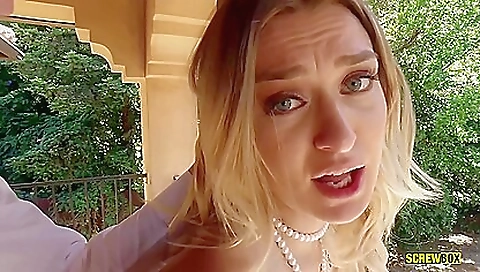 Sexy blonde fucks herself and her boyfriend in the car