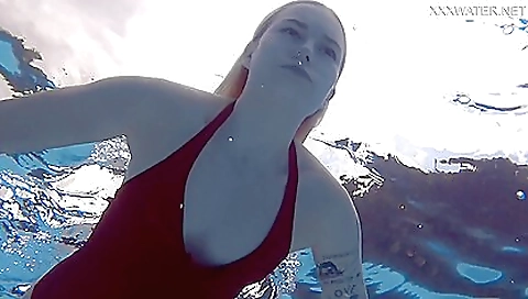 Tattooed blonde with a sexy ass gets naked in the shower