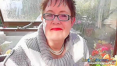 Mature brunette with big boobs rides a big black cock