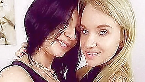 Two sexy chicks show off curves and enjoy each others pussy