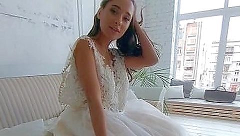 Sexy brunette with a nice face and sexy body is doing solo porn