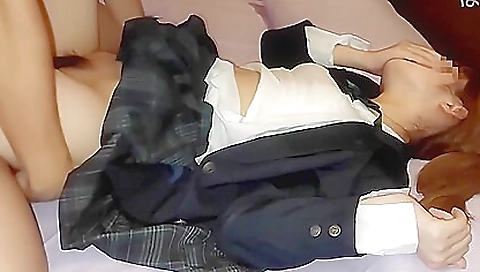 Asian babe with a hairy pussy gets her cunt fingered