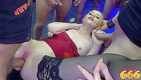 Horny blonde milf rides two big cocks in a interracial scene