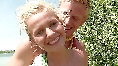 Hot brunette in sexy lingerie is getting her face pierced