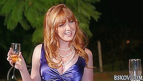 Redhead babe sucks cock in the bedroom while partner in bathroom