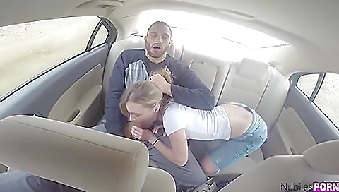 Blonde babe fucking in the backseat in a hot porn clip