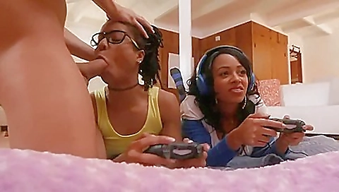 Ebony girl rides a black and gives a blowjob to a black guy