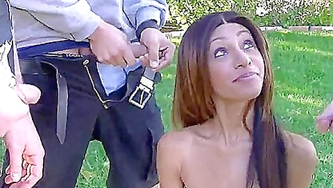 Big ass brunette hottie in a pair of sexy jeans and a red dress