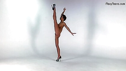 Stunning brunette in the gym and in her gym shorts